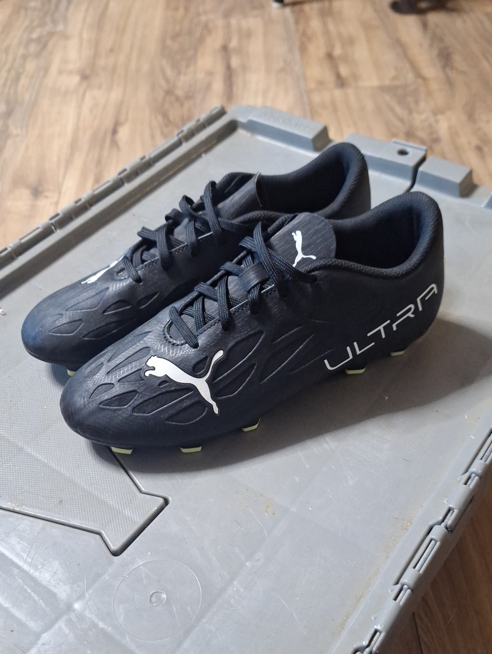 Puma Ultra Men's Black Athletic Soccer Cleats with White Logo